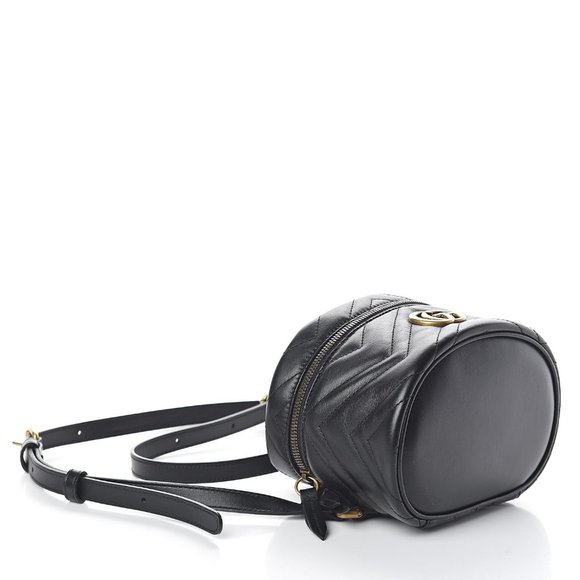 gg marmont matelass mini backpack Gucci Black Bag  THE CLOSET Flap magnetic closure and interior drawstring with toggle Gucci GG Marmont Matelasse Mini